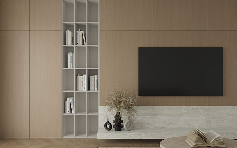 Living room with minimalist wood paneling and simple shelving unit.